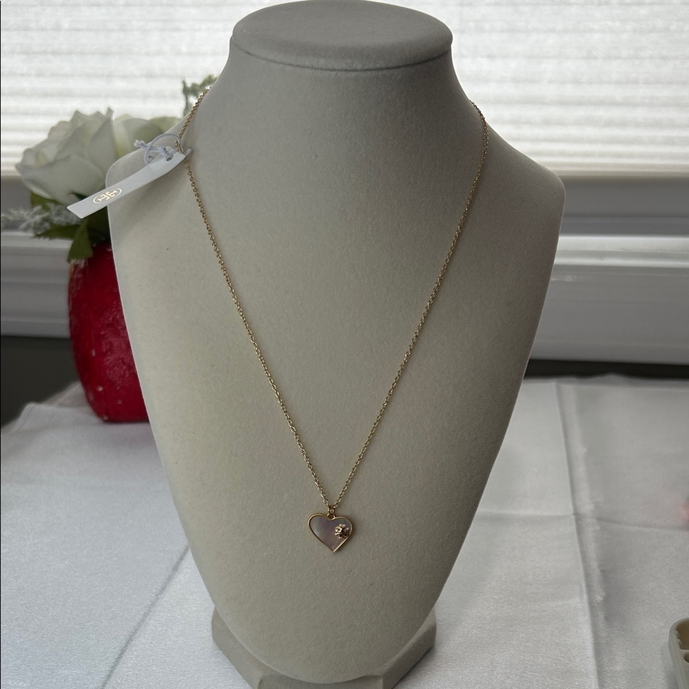 Brand new Tory Burch gold necklace with a shape of a heart pendant